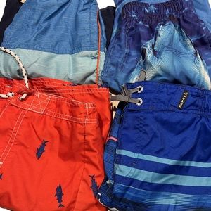 Lot of boys swimsuits.  Shark themed lot.  In excellent used condition.